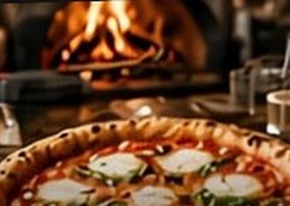 Pizza vor dem Holzofen